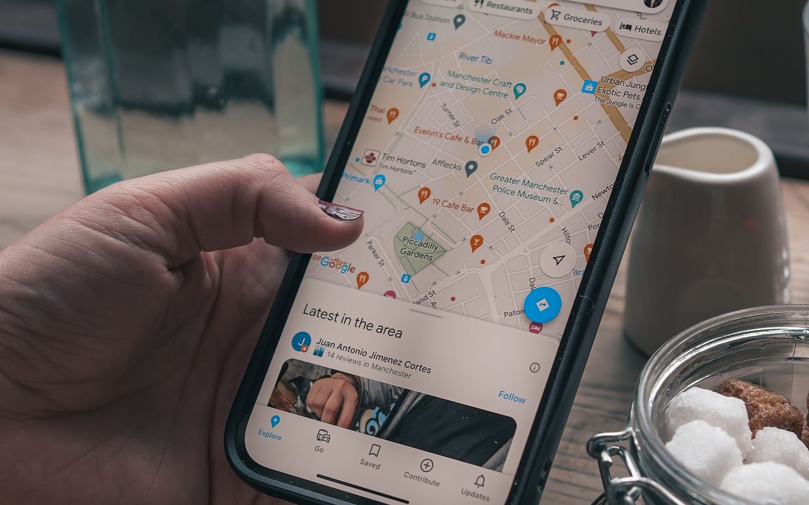 Local business owner checking Google Maps visibility on a phone